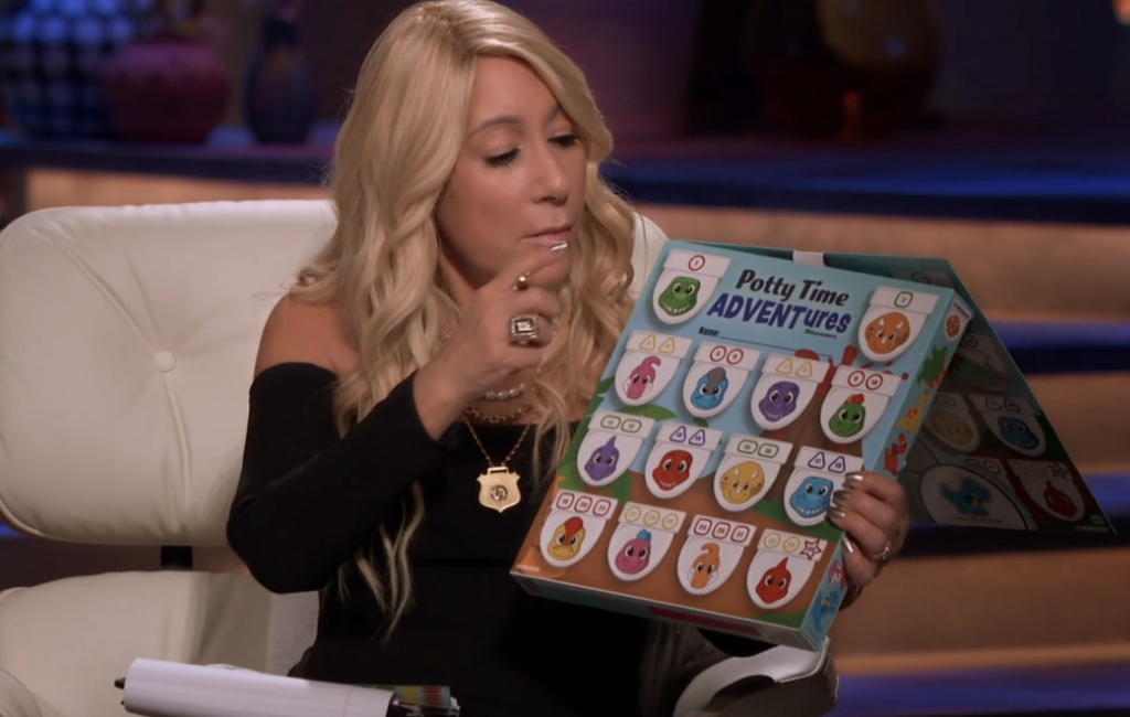 Lori holding potty puzzles