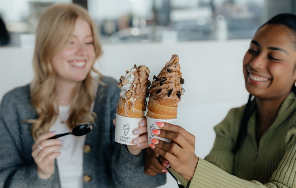 women eating crispy cones