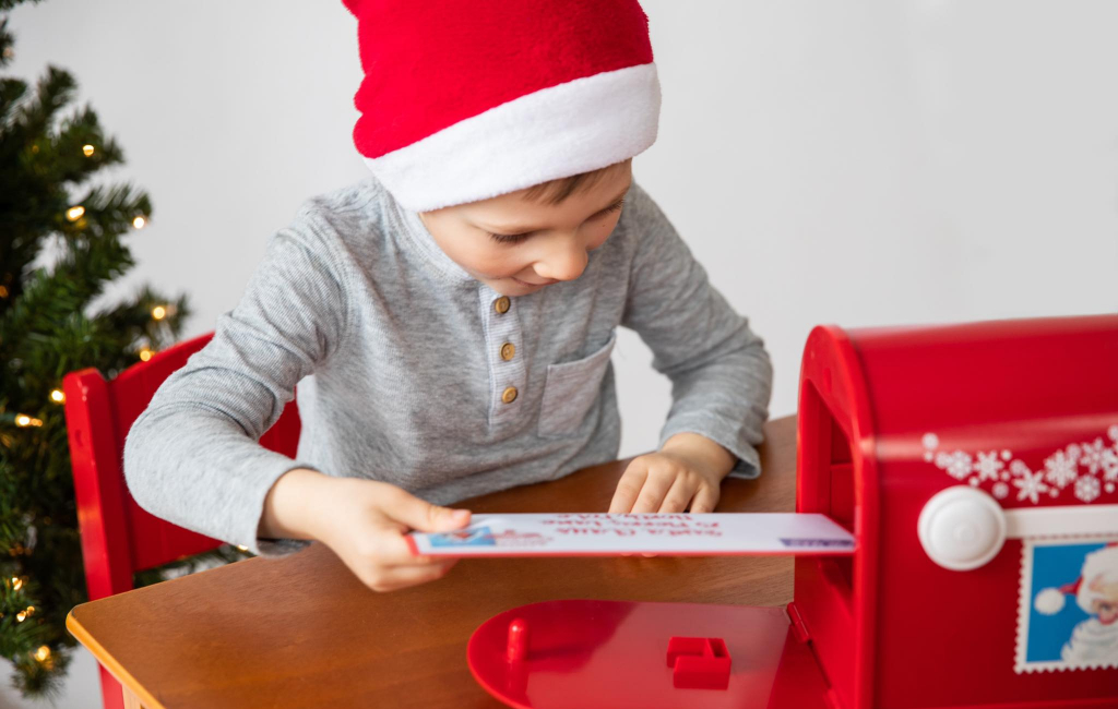 kid putting letter