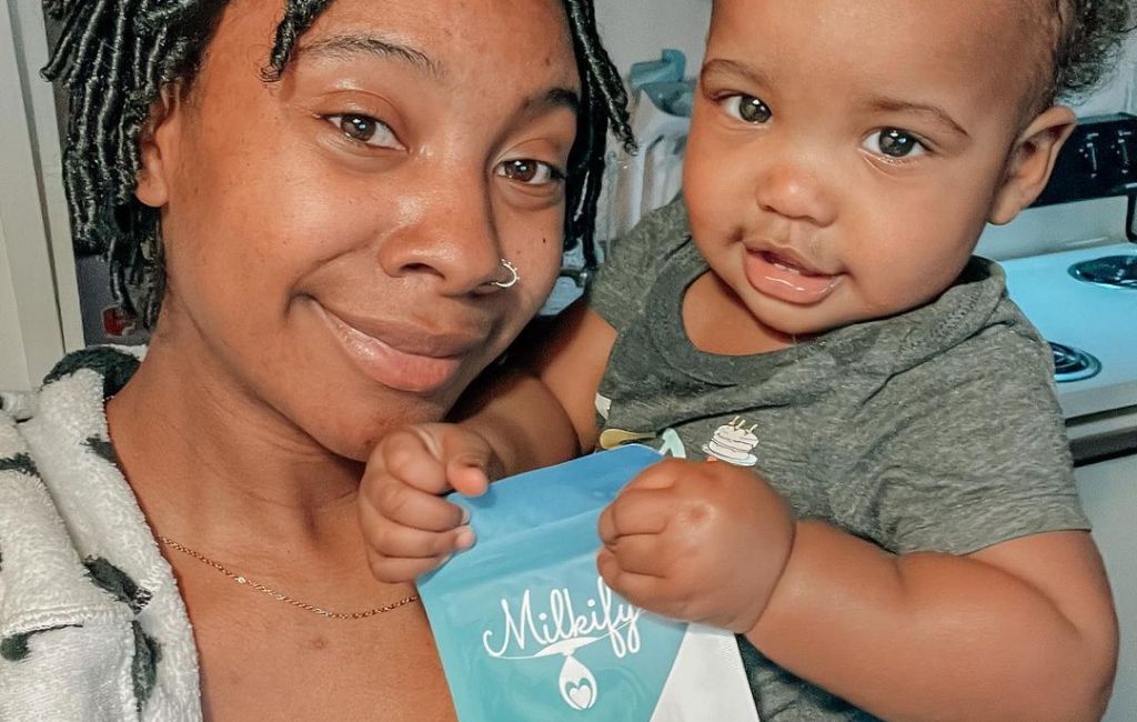 mom and son with their milkify breast milk freeze-drying product