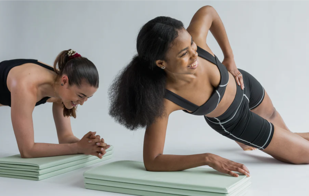 exercising using stakt foldable fitness mat