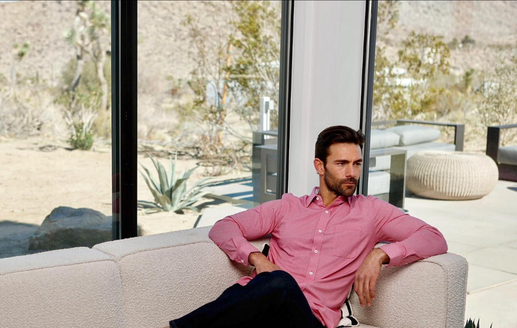 man sitting on couch