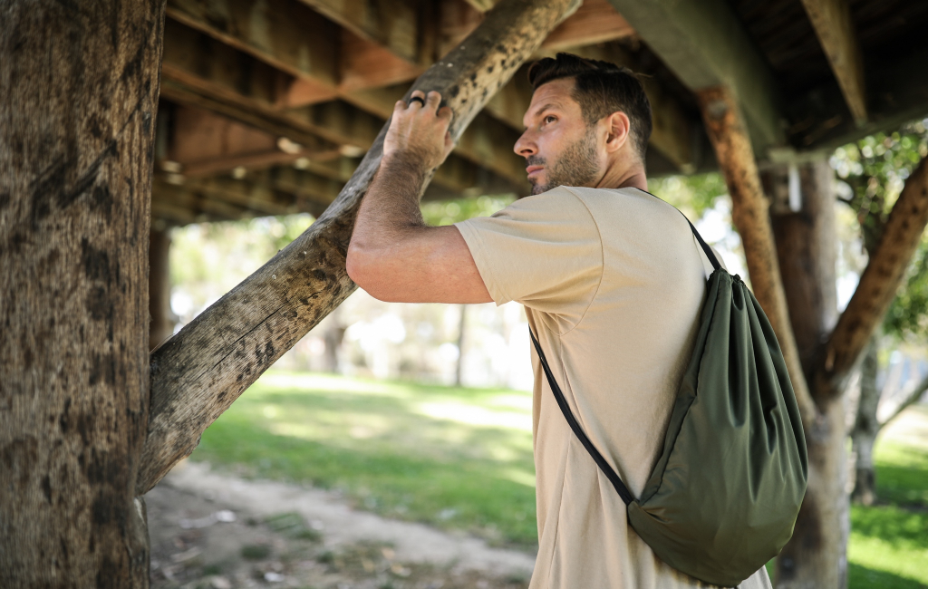 man with hoodie backpack