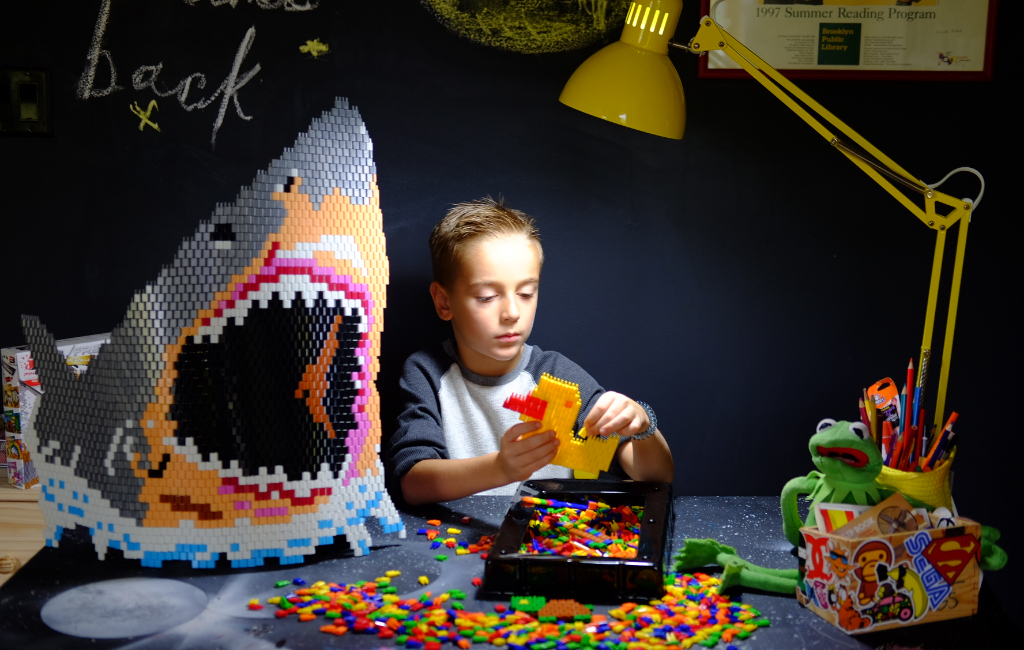 kid playing with blocks