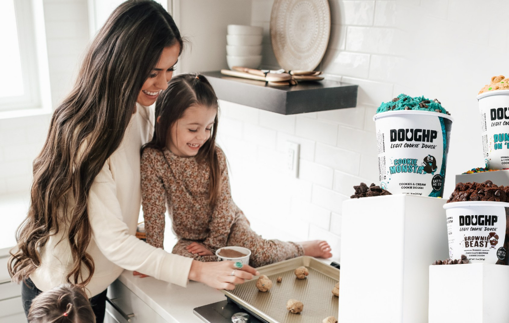 mom and daughter making cookies