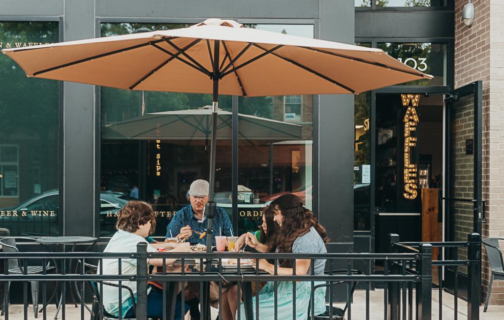 family eating at press waffle