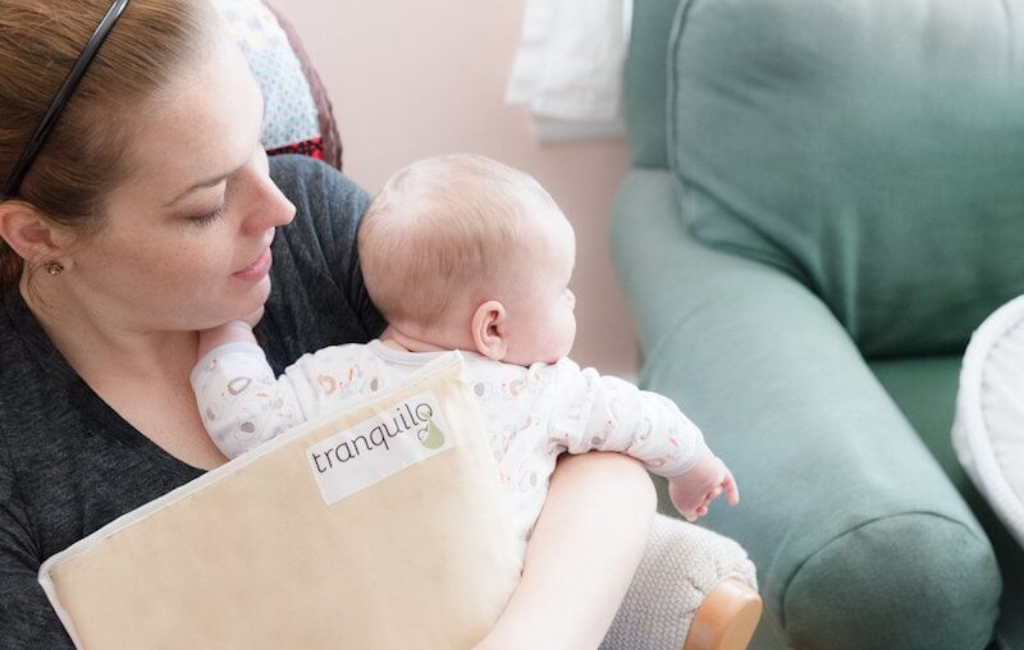 woman holding baby