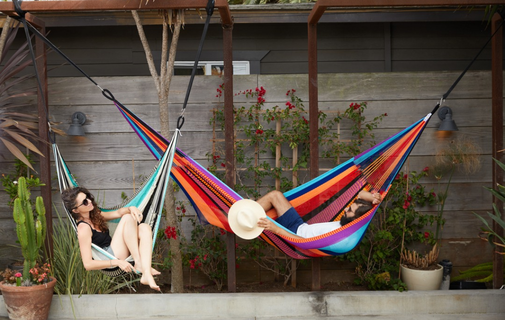 a-couple-using-yellow-leaf-hammocks