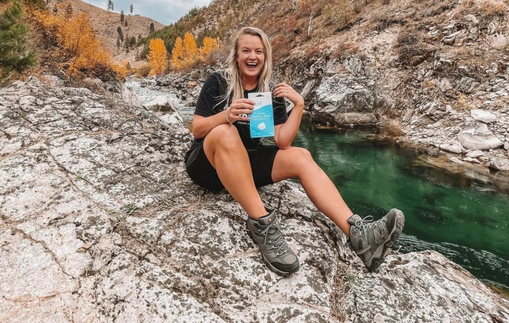 woman-hiking-on-river