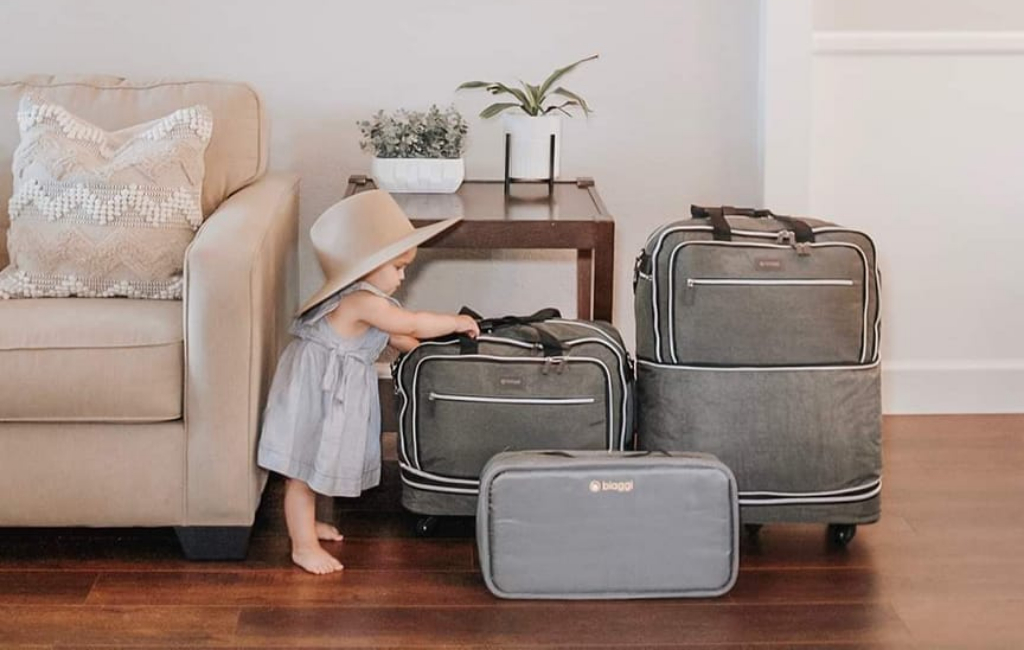 little girl with luggage