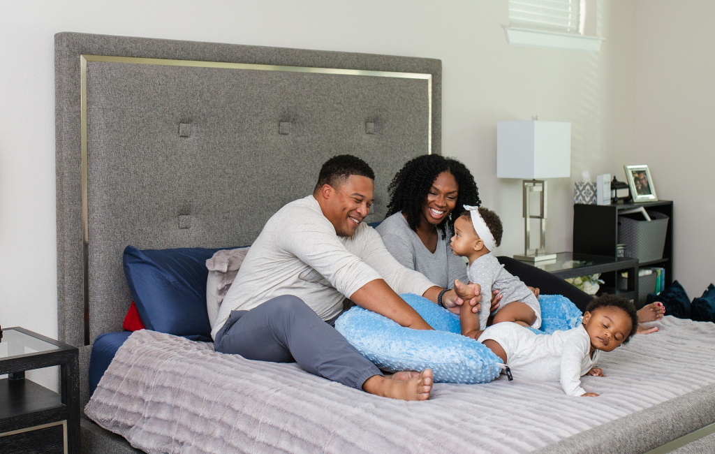 happy family on the bed