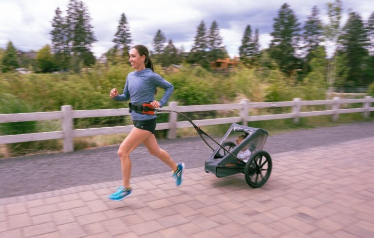 mother-running-with-kidrunner-hands-free-running-stroller