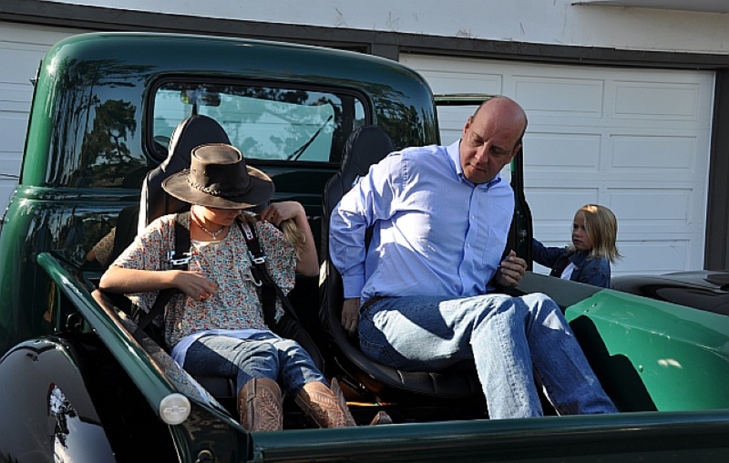 people sitting in pickup