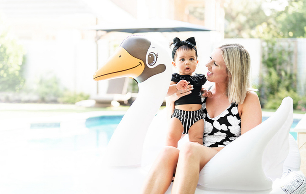 mom and baby on pool