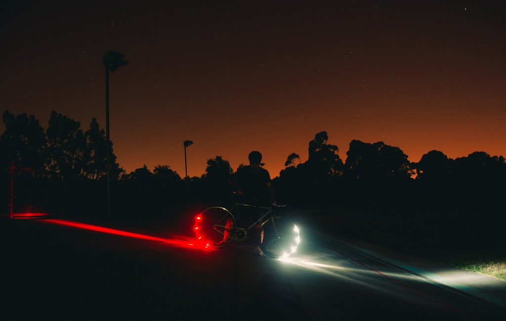 man-with-bicycle-lights